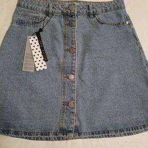 Adorable little denim skirt.